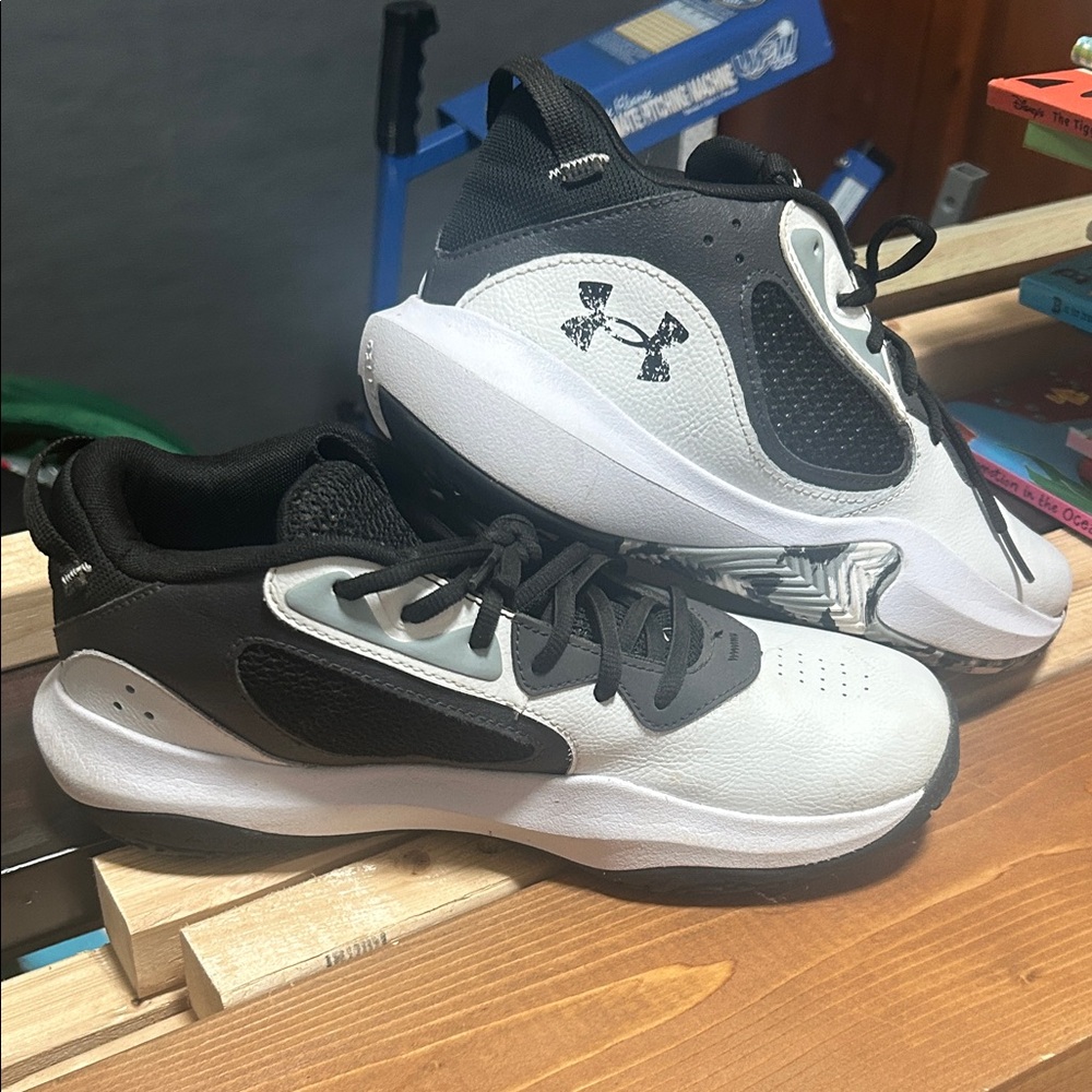 Under Armour Men’s Black and White turf shoes